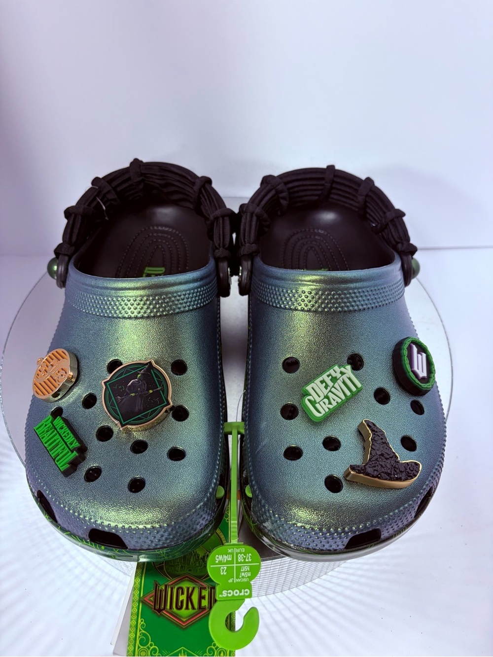 CROCS Kids Iridescent Green Holographic Clogs with Charm Accents